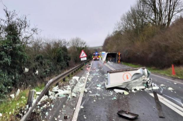 Suspected drunk driver arrested after lorry overturns on A-road