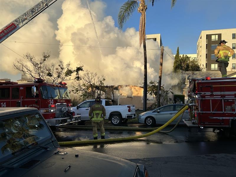 Fire burns through roof of vacant home in University Heights