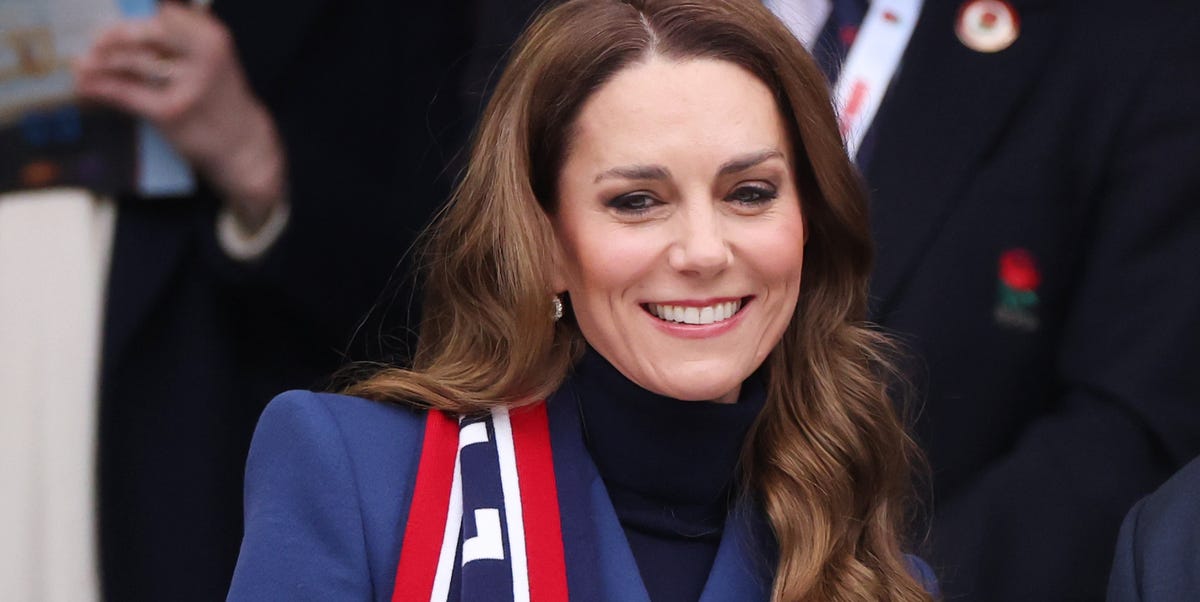 Princess Kate watches rugby in her favorite royal-blue coat