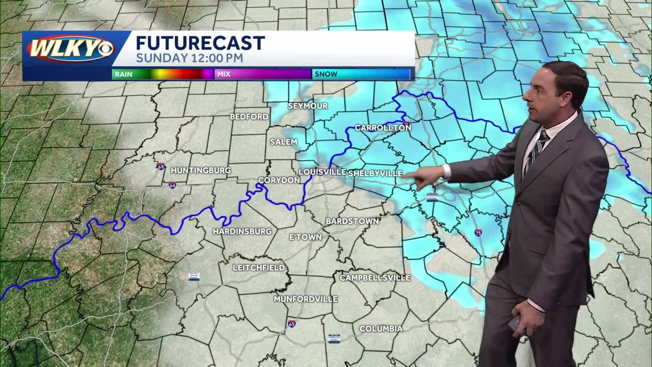 Cold and breezy with a few flurries Sunday