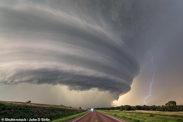 Storm chaser reveals how his car was trapped by felled power lines as a ...