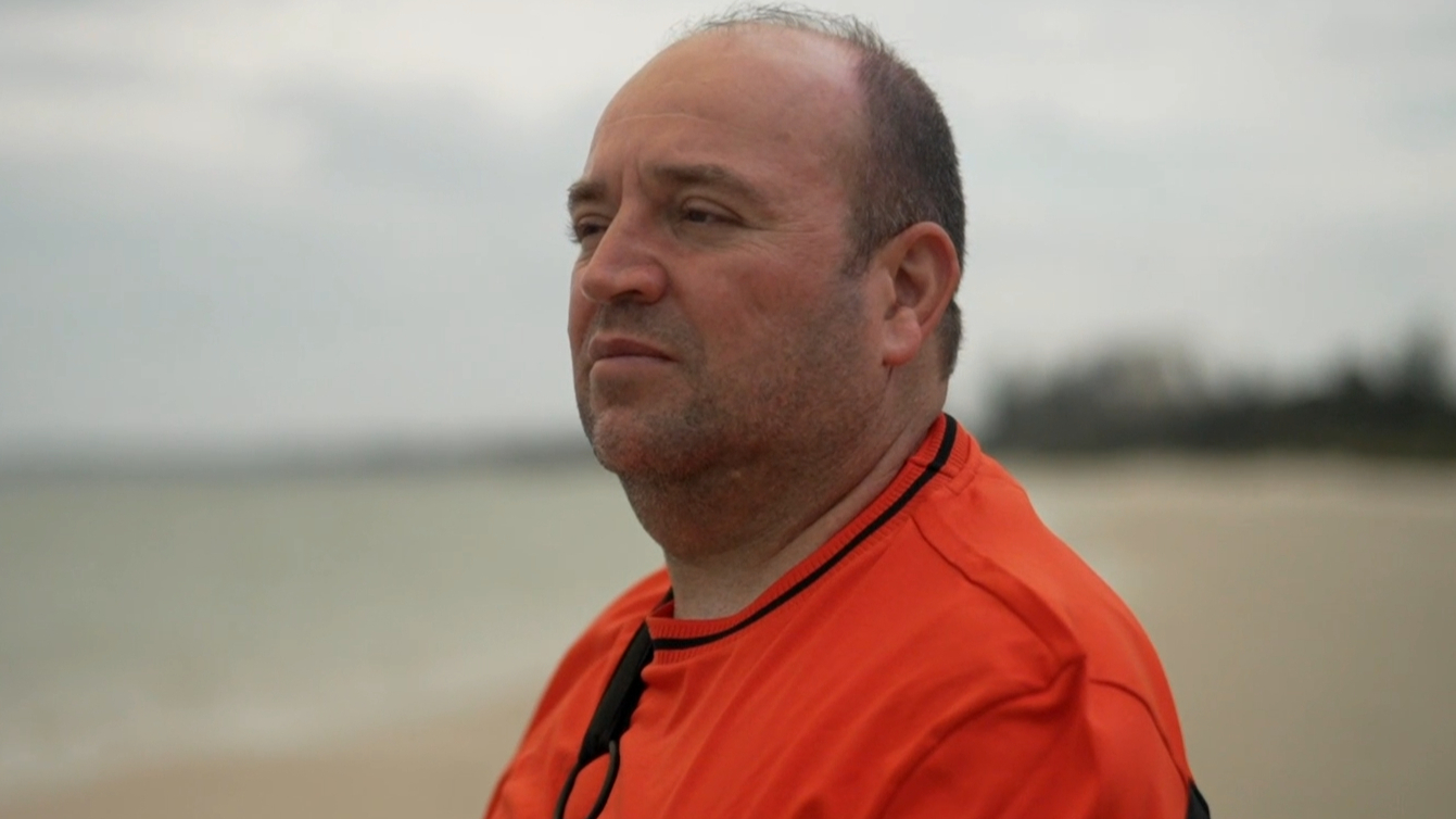 Hero bodyboarder saves woman swept out to sea