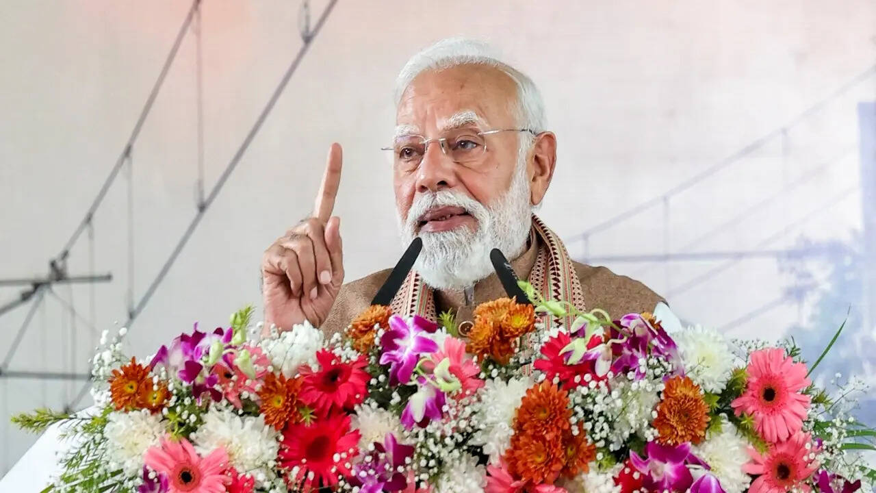 PM Modi tears into Congress over 'shirtless' protest at AI summit ...