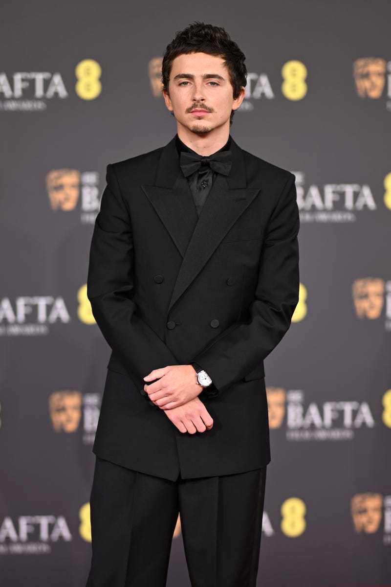 Timothée Chalamet looks sharp in an all-black Givenchy tuxedo at the ...
