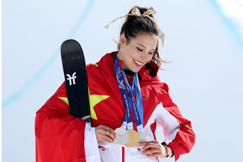 Eileen Gu with her Olympic gold medal.