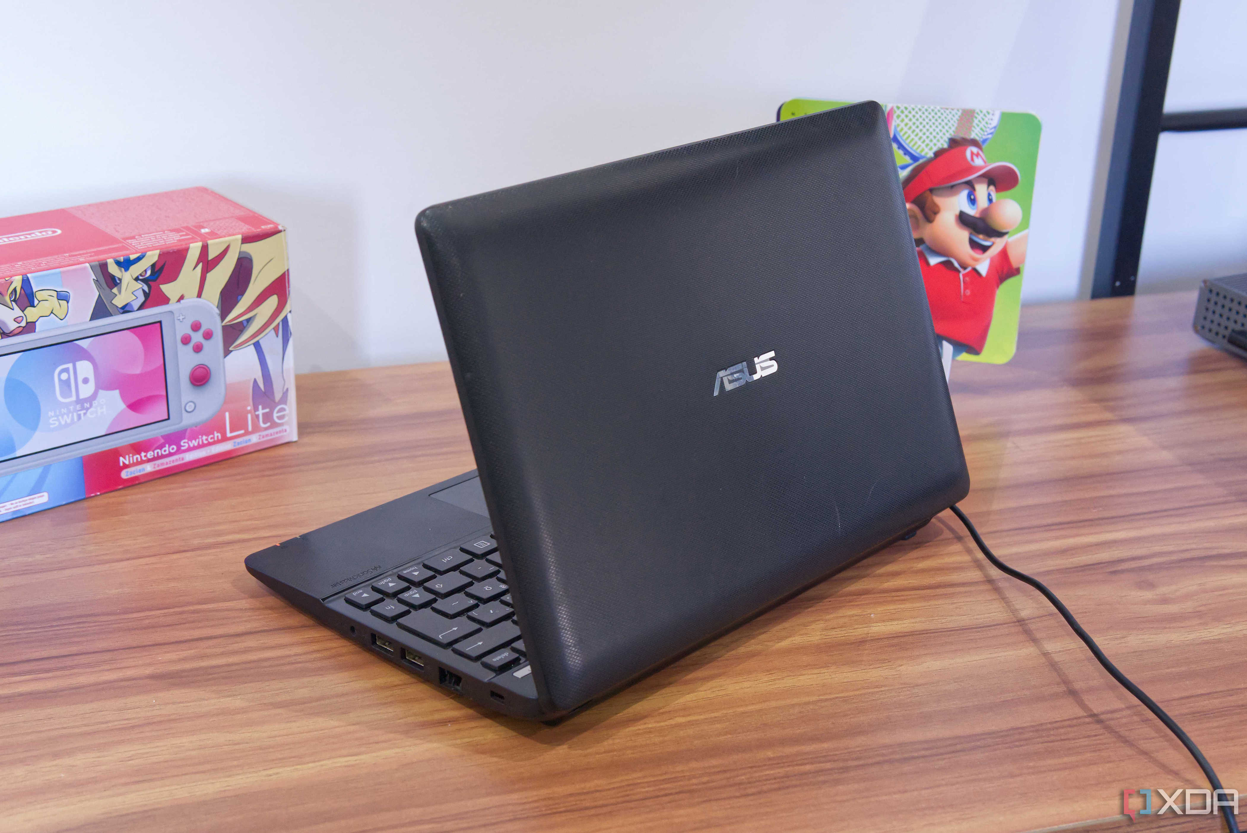 Rear angled view of the Asus X102B laptop