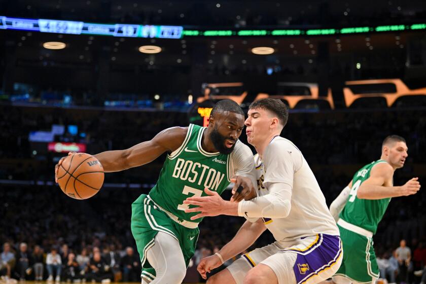 With Pat Riley watching, Lakers routed by Celtics in rivalry game