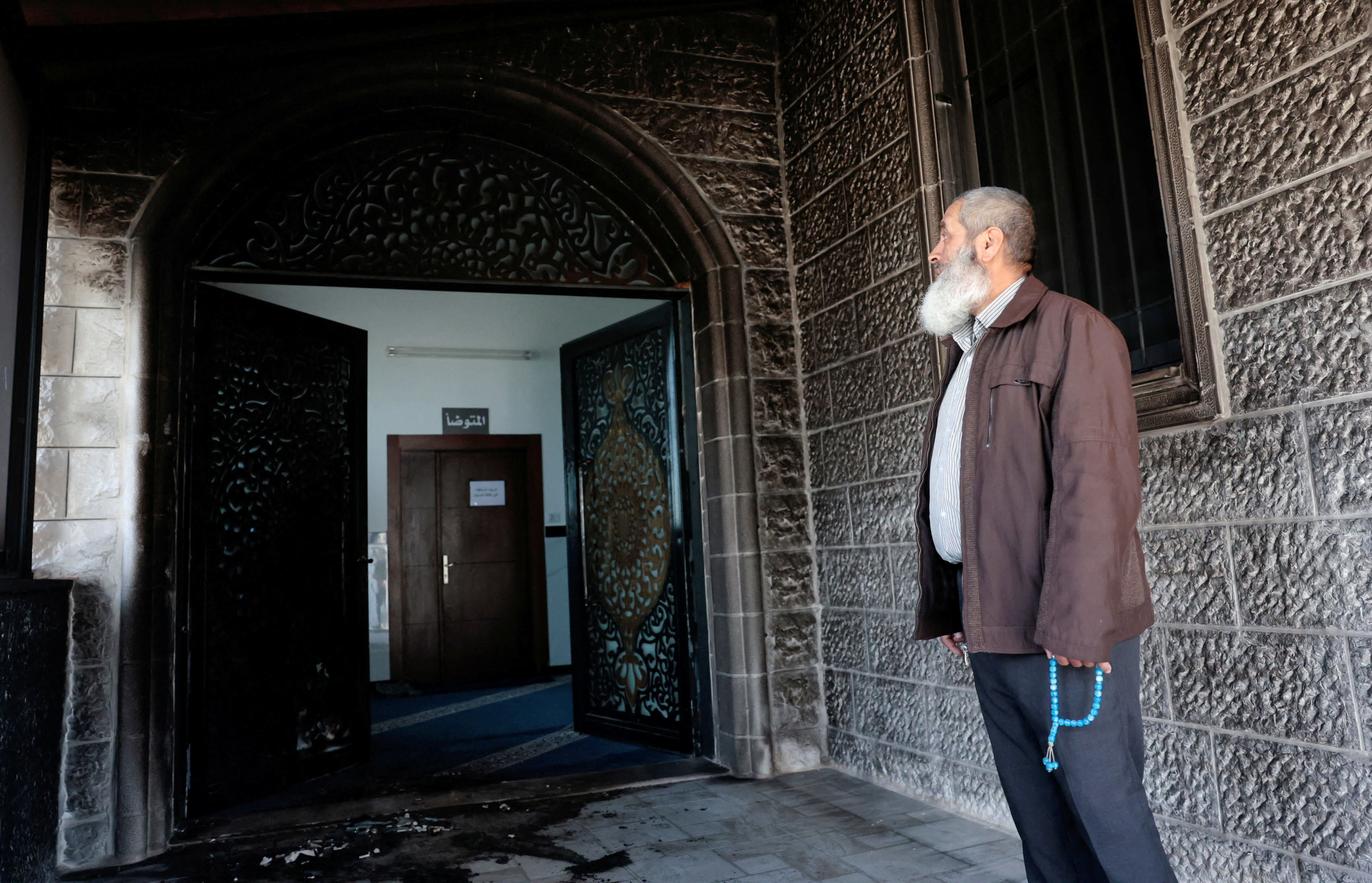 Jewish settlers reportedly set fire to mosque near Nablus, spray