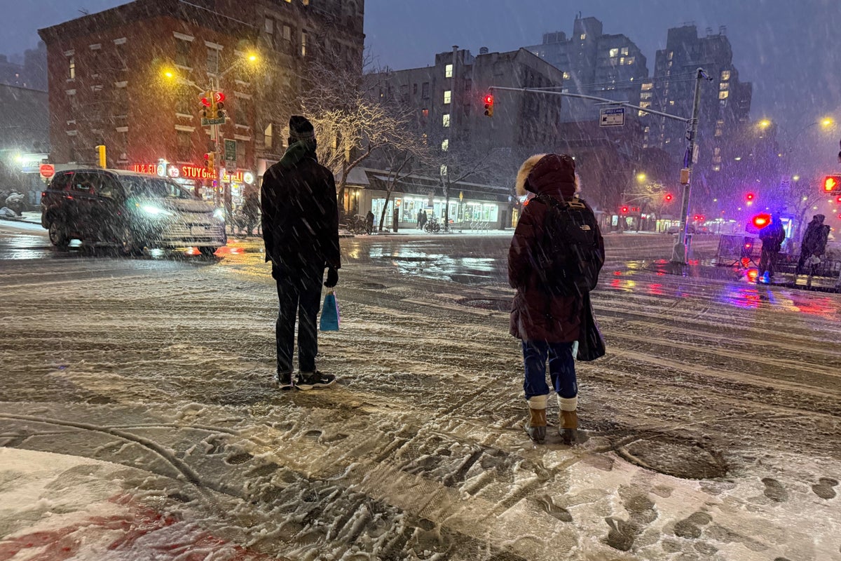 Travel ban and blizzard warnings as millions brace for 'bomb cyclone'