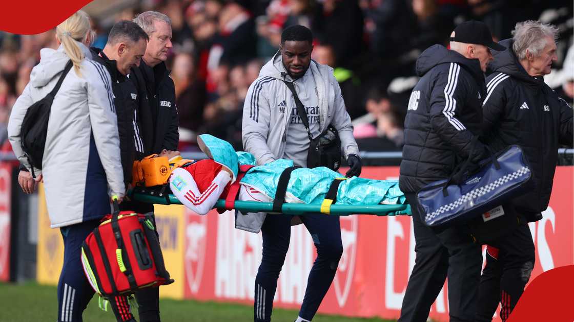 Arsenal W forward Olivia Smith being stretchered off the field. Photo by Izzy Poles. Source: Getty Images