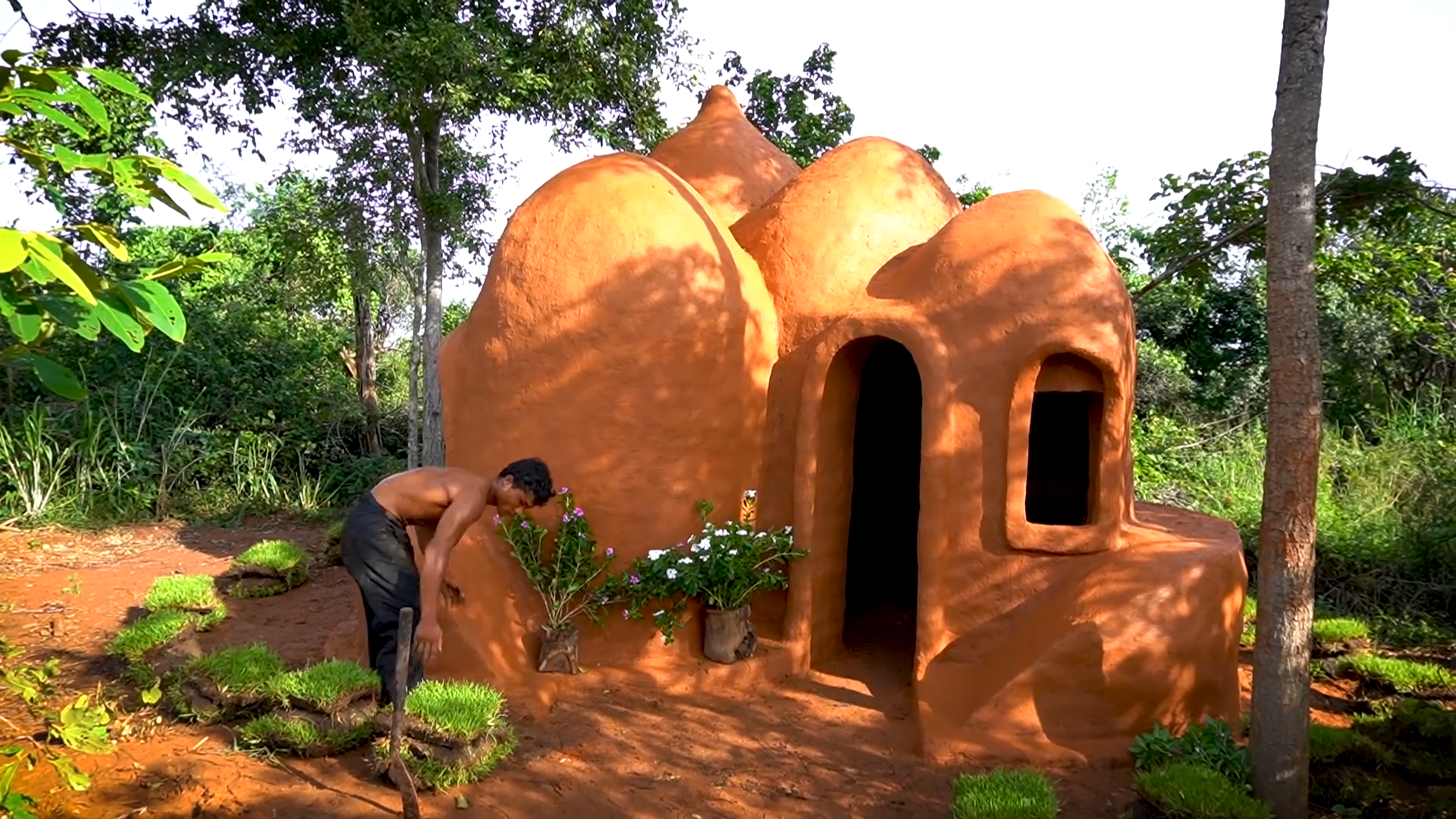 After weeks of trial and error, the mud house finally stood right