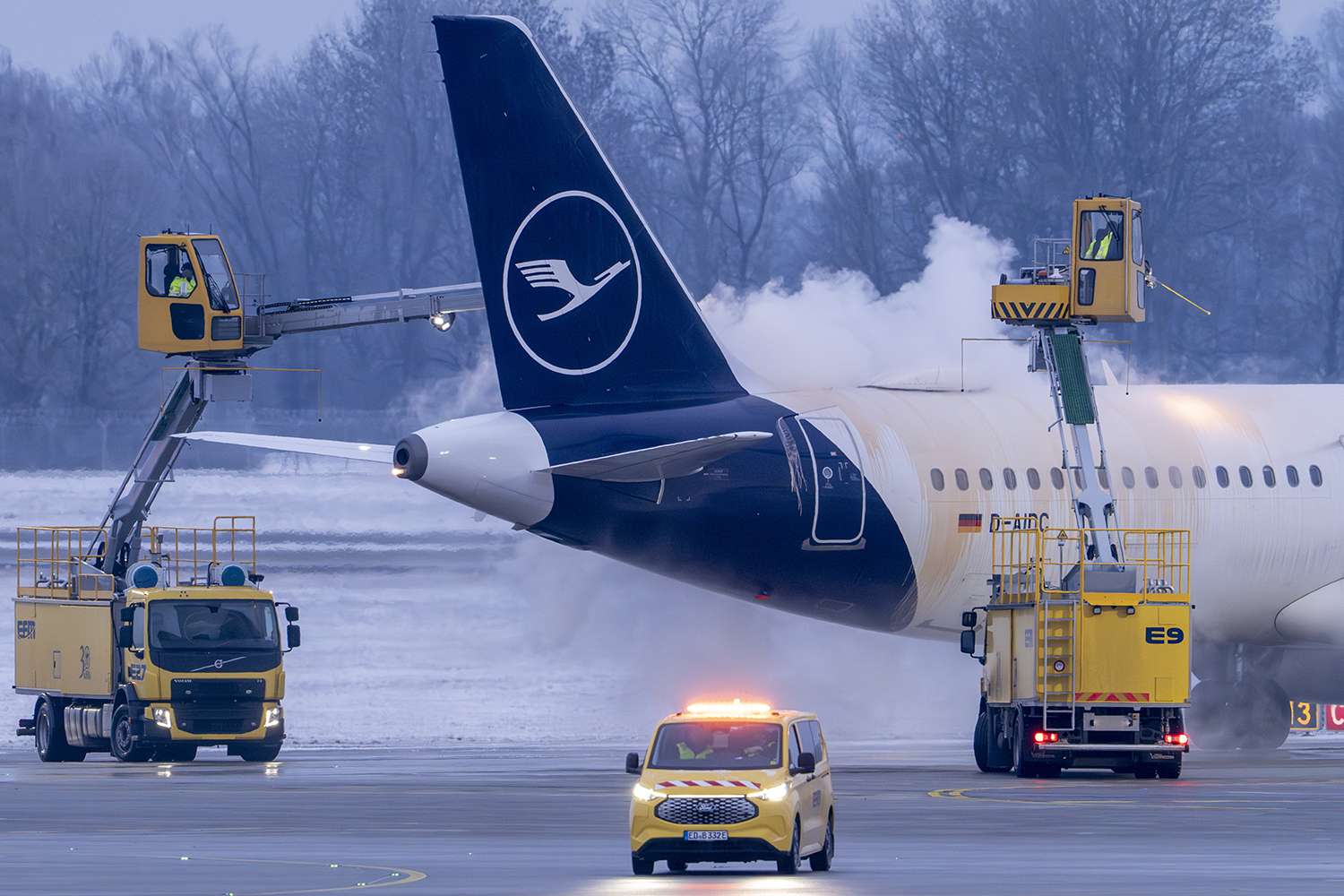 500 passengers forced to spend night on grounded planes after heavy ...