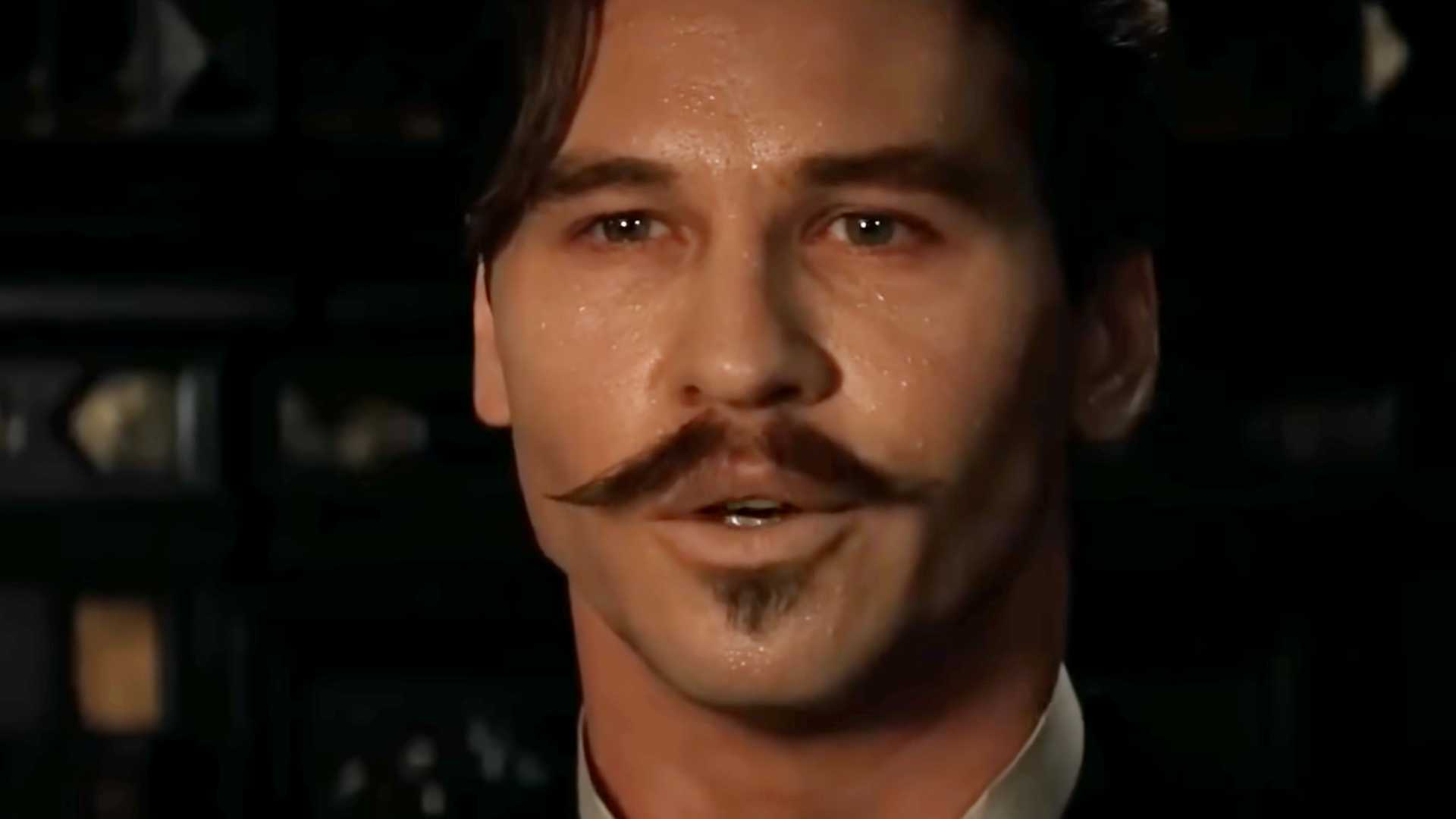 Val Kilmer as Doc Holliday sweating in Tombstone.