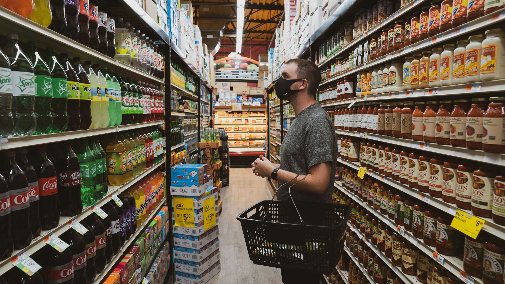 Americans are cutting back on food and health care as costs rise