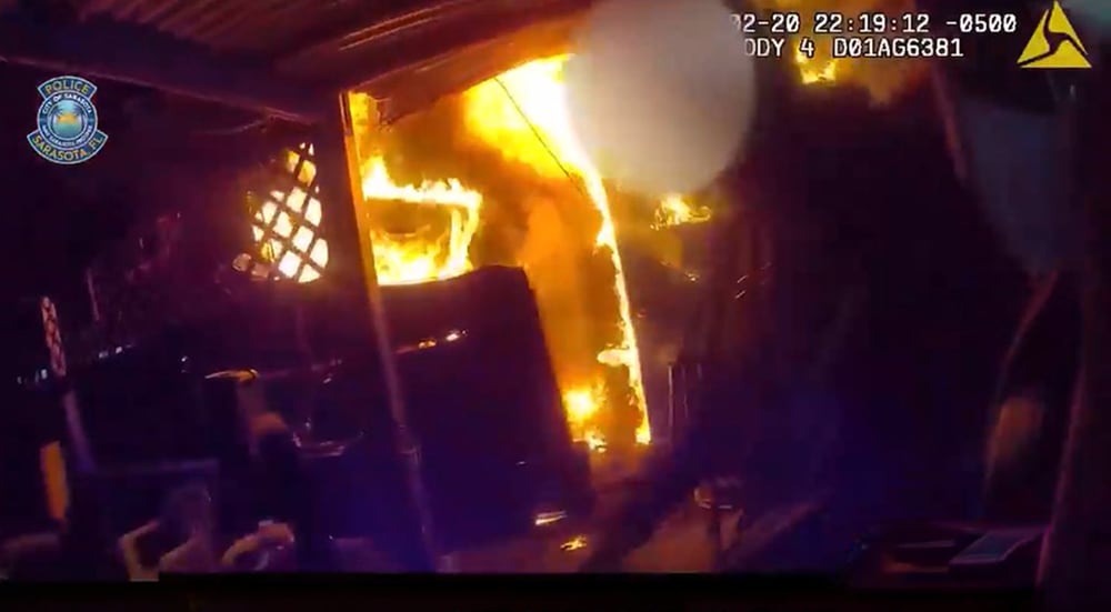 Sarasota officers rescue two from burning home on North Osprey Avenue