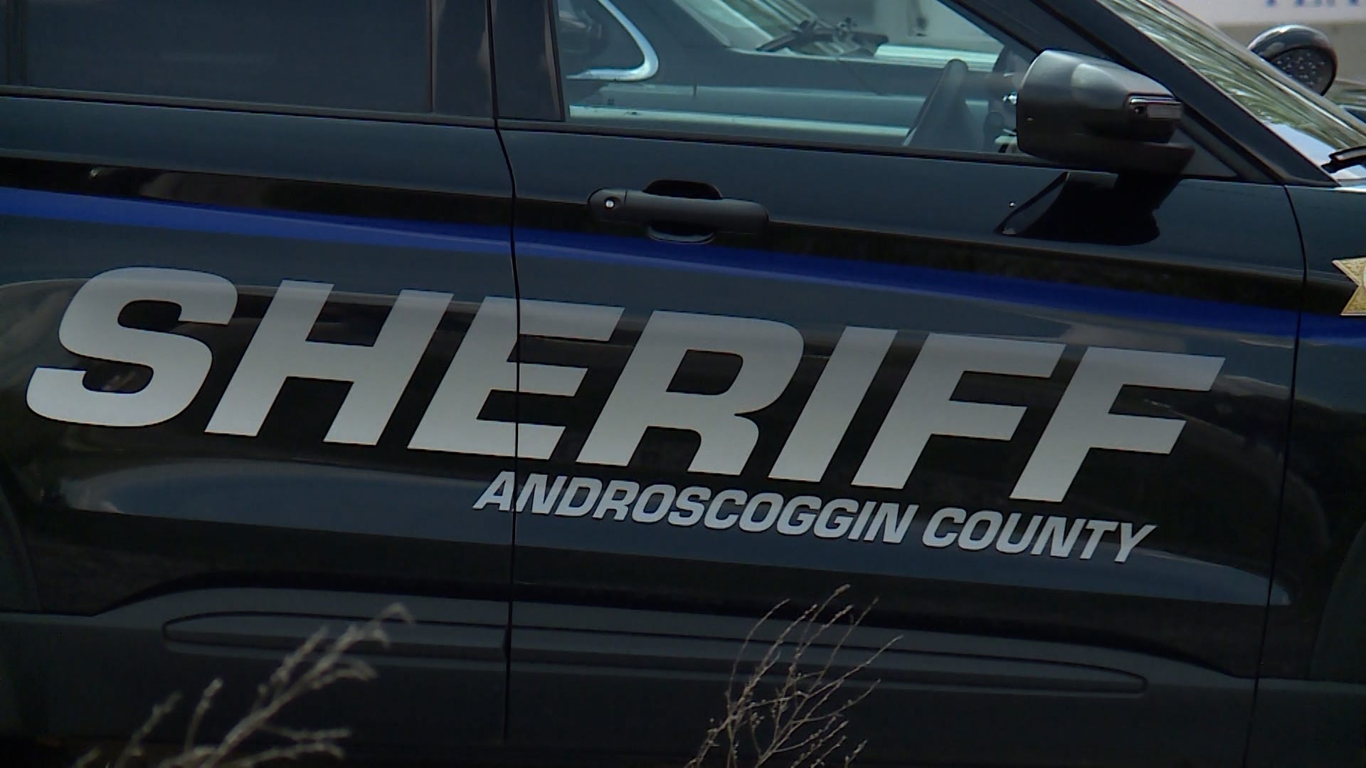 Woman dies after car crashes into truck pulling a camper in Poland, Maine