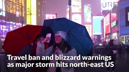 Travel ban and blizzard warnings as major storm hits north-east US