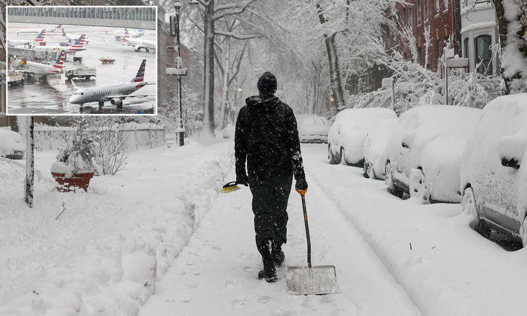 Travel chaos at NYC and Boston airports as blizzard brings 20" of snow ...