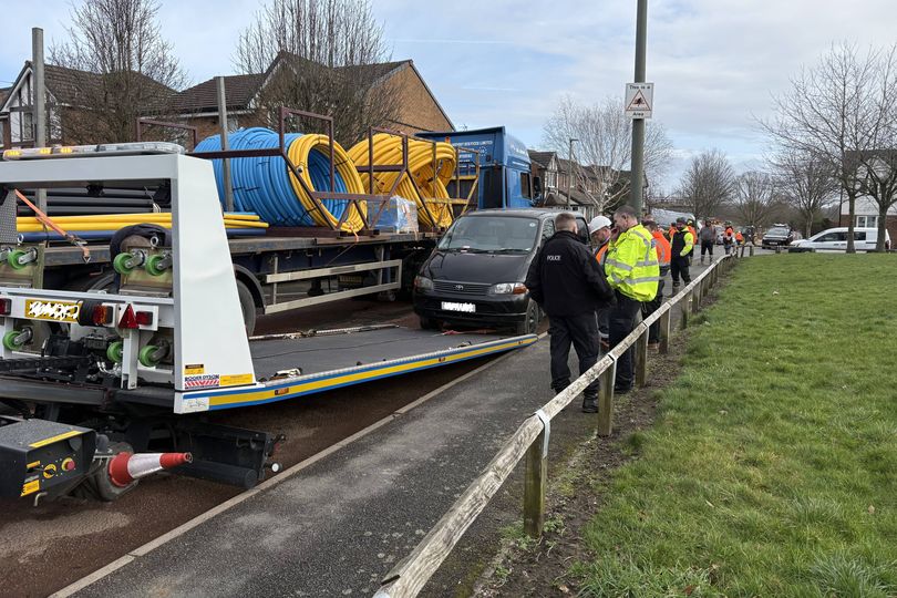 Four-hour 'Mexican stand-off' in Wigan as cars block lorries heading to ...
