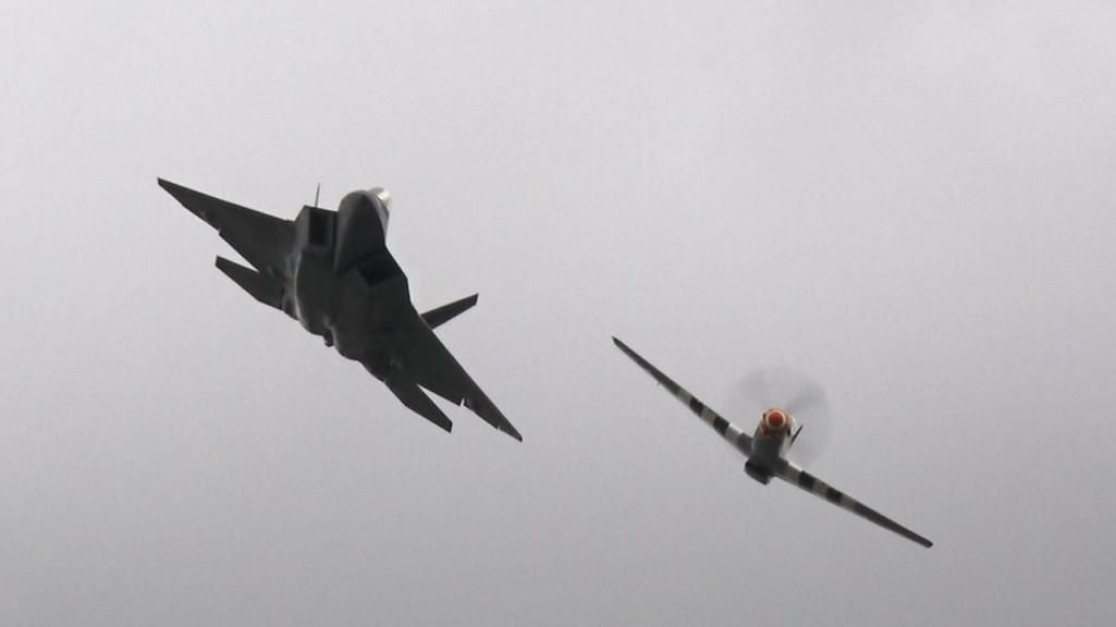 Watch an F-22 Raptor fly formation with a P-51 Mustang