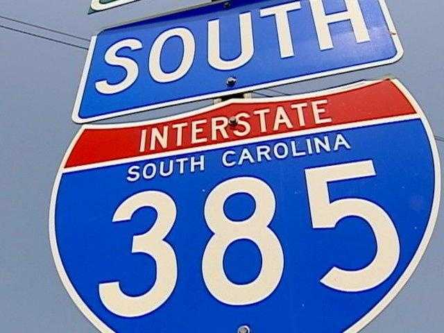 Woman dies when she is hit by 18-wheeler on I-385, coroner says