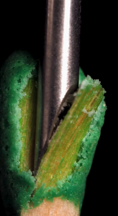 Match and needle in slow motion: Captivating close-up