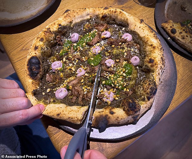 A pizza history! Pie inspired by the ancient Romans features stomach ...