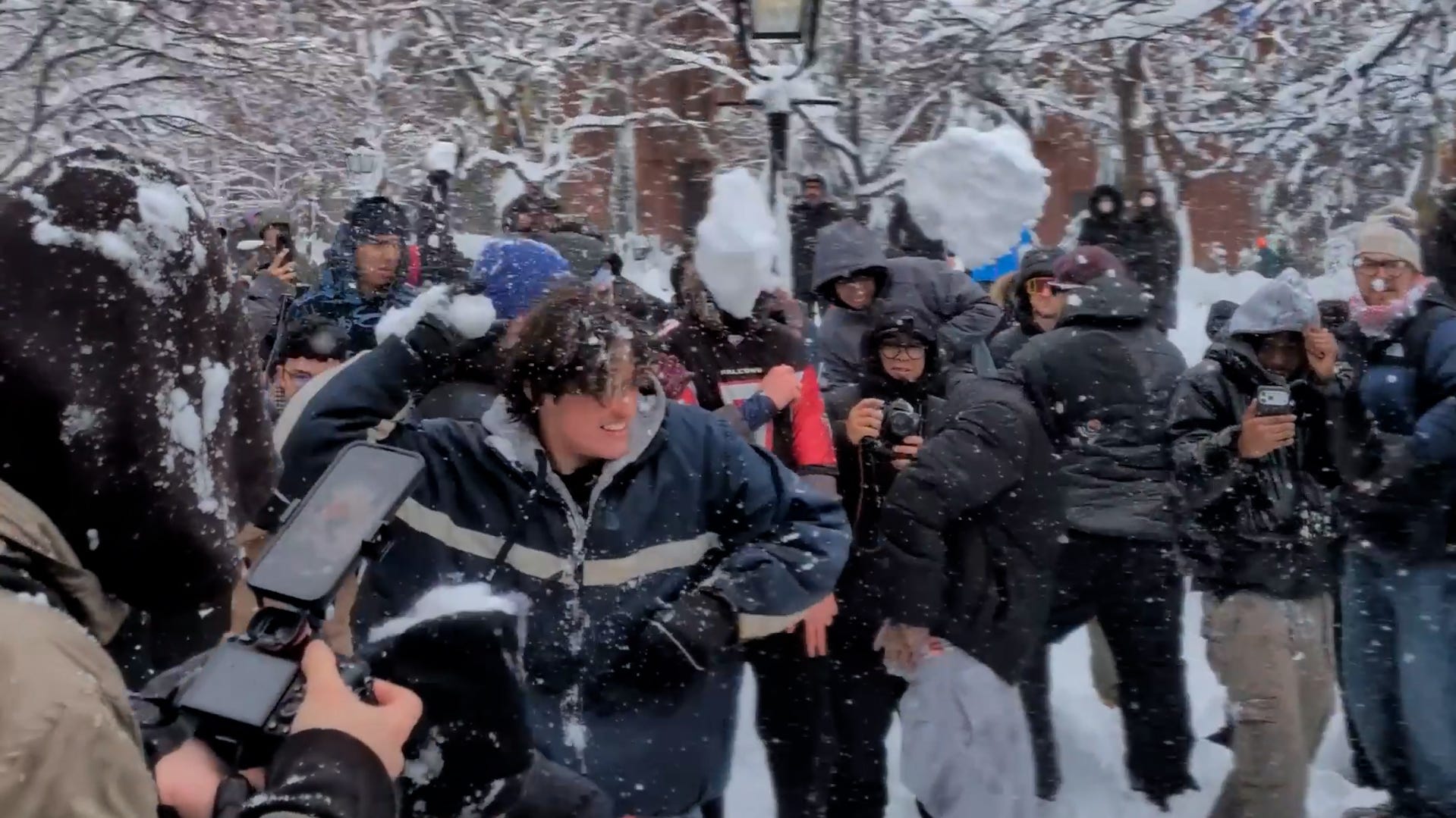 New Yorkers break out in massive snowball fight in Washington Square Park