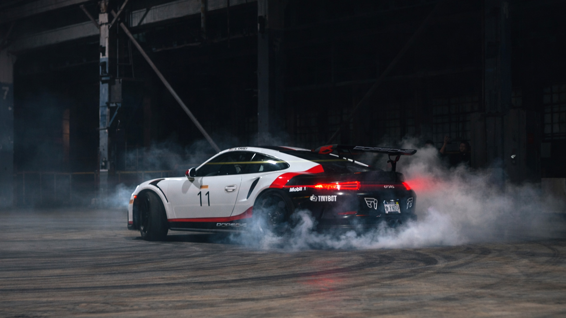 Drifting supercars in an abandoned LA warehouse