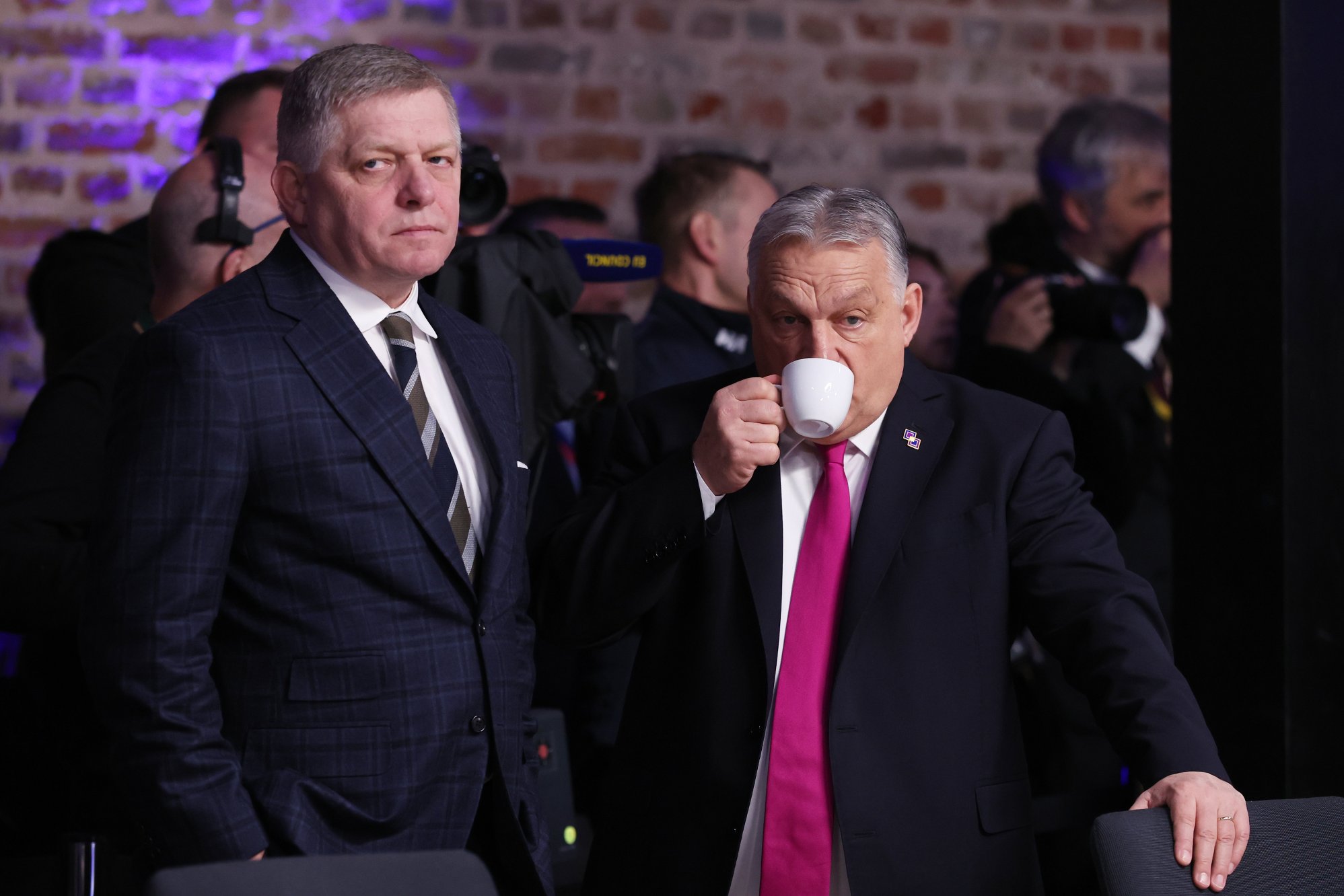 Hungary's Prime Minister Viktor Orban, right, speaks with Slovakia's Prime Minister Robert Fico during a round table meeting for the EU summit at Alden Biesen Castle in Bilzen-Hoeselt, Belgium, Thursday, Feb. 12, 2026. (AP Photo/Omar Havana)
