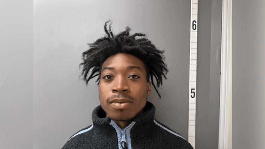 Russellville man charged with firing into home, grazing person inside