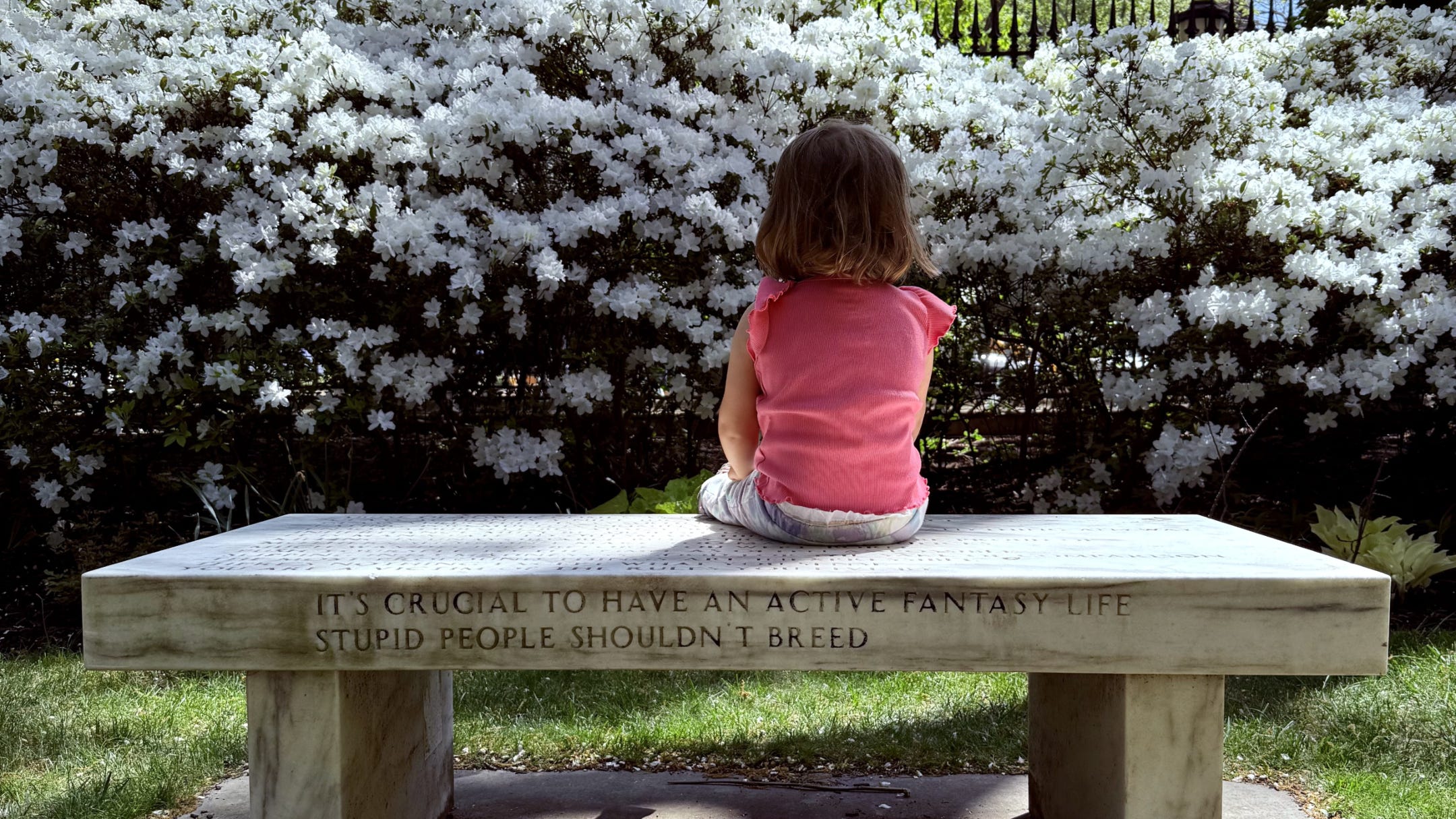 Toddler sitting on bench