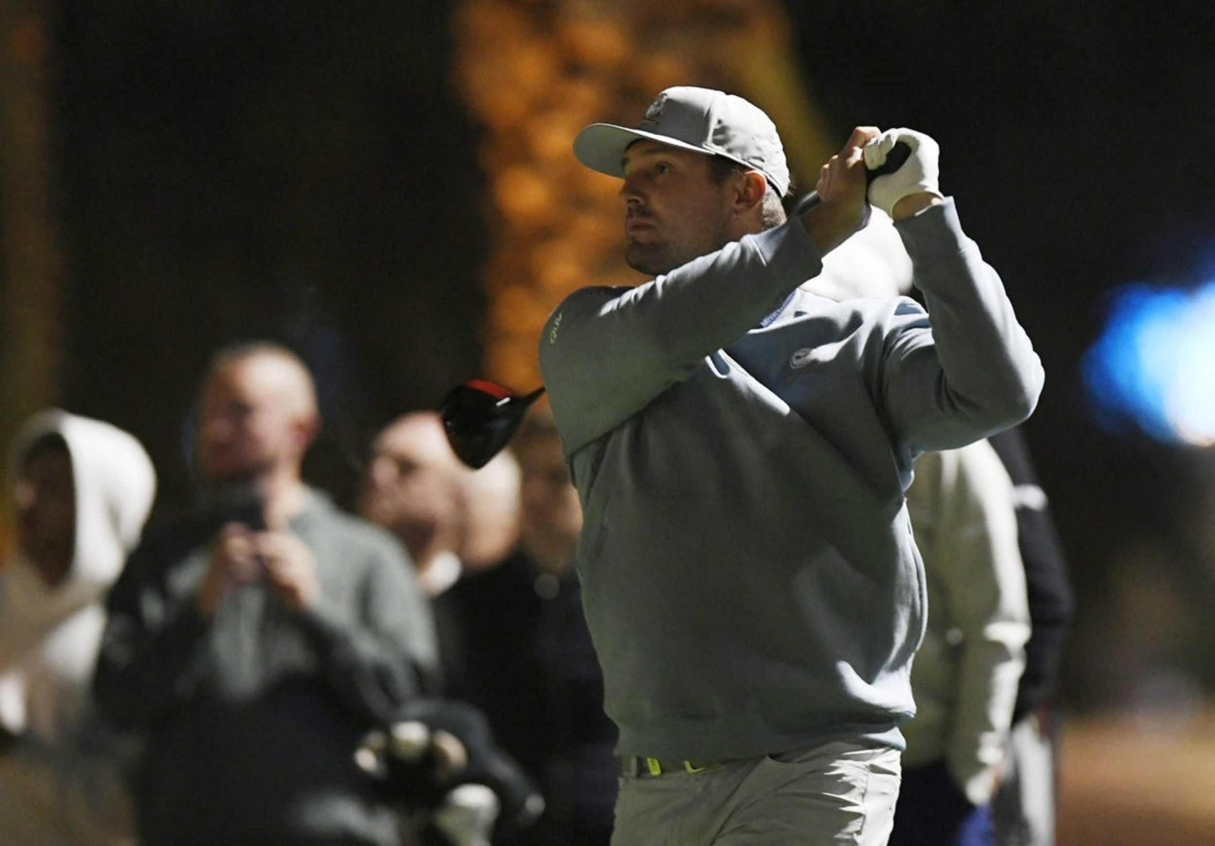 Bryson DeChambeau survives mishit tee shot, shares lead in Adelaide
