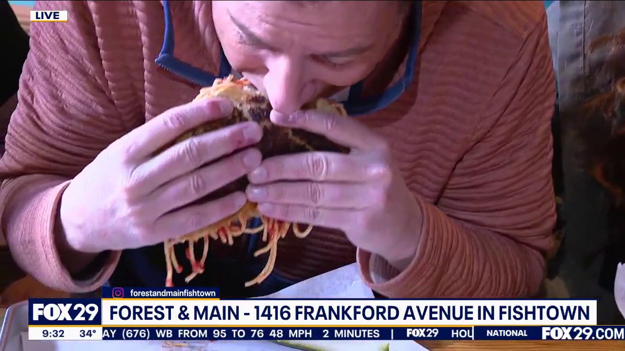 Bob sinks his teeth into the spaghetti sandwich