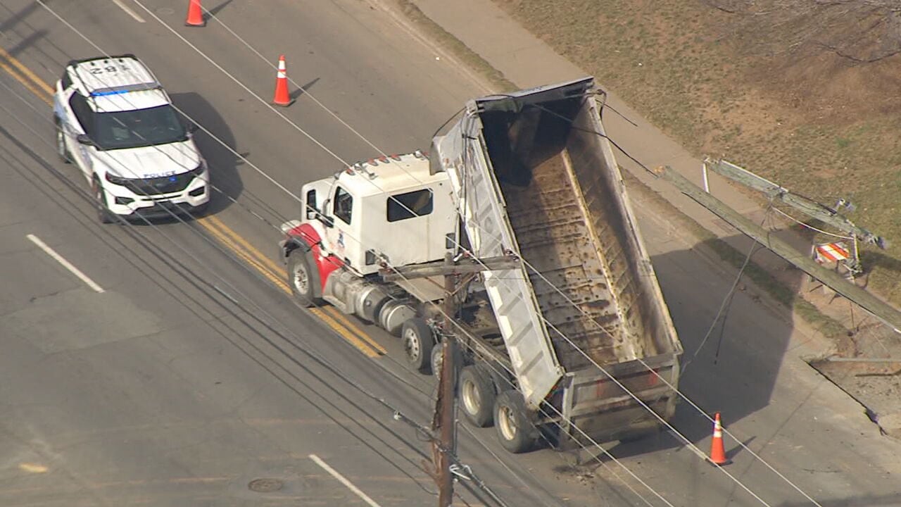Dump truck downs power lines in South Charlotte