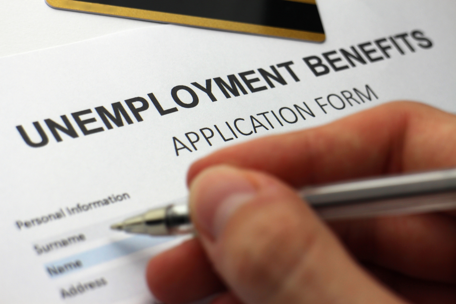 Initial jobless claims slightly higher than expected in past week