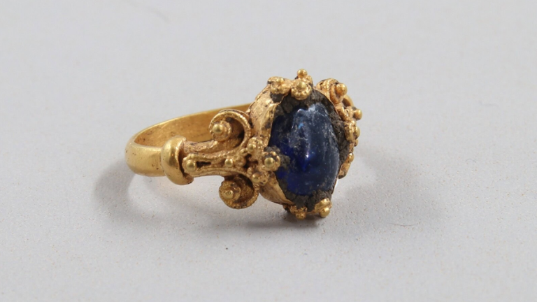 Medieval gold ring with dazzling blue gemstone discovered in Norway is ...