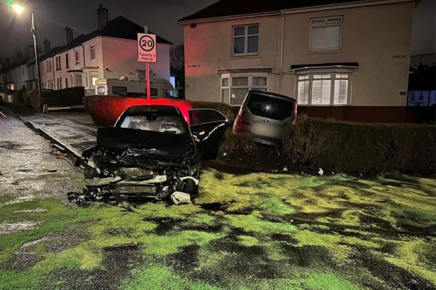 Three-vehicle crash ends with car ploughing into front garden as police ...