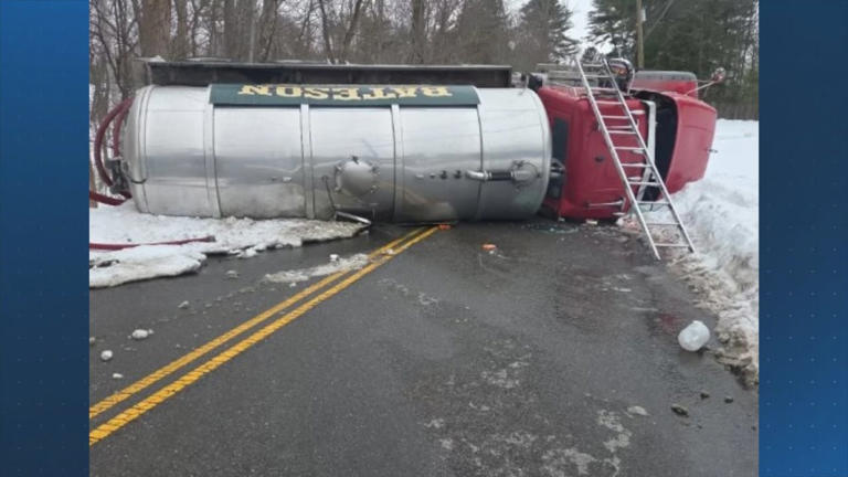 Driver hospitalized after septic truck rolls over during crash, leaks waste