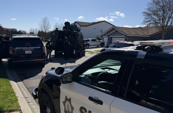 Armed suspect barricaded inside Mather home in domestic violence ...