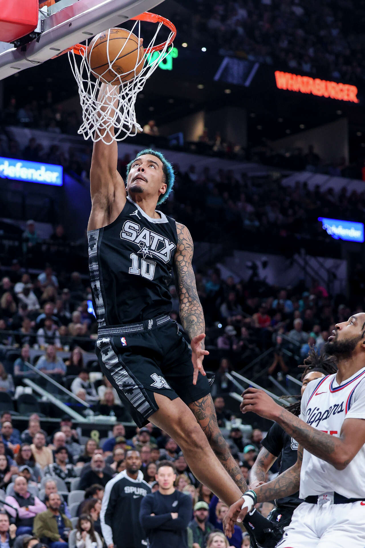 See photos of Jeremy Sochan's colorful time with the Spurs