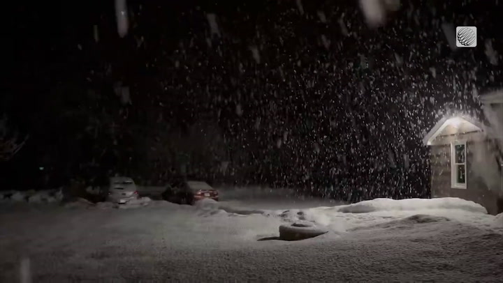 Large snow flakes fall on this rural Nova Scotia property