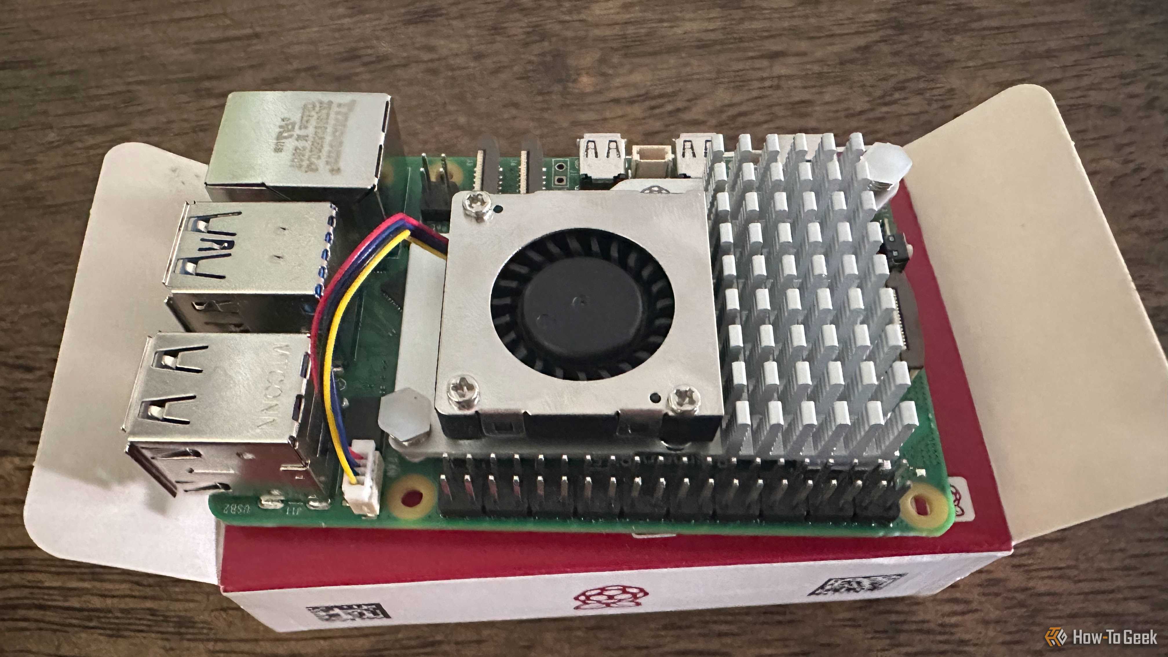 A Raspberry Pi with its offiical cooler fitted.