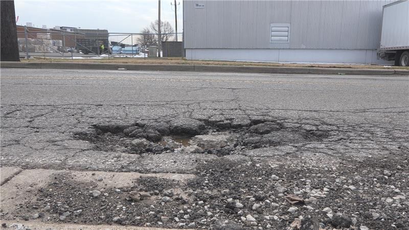 Louisville Metro crews work around the clock to fill potholes following ...