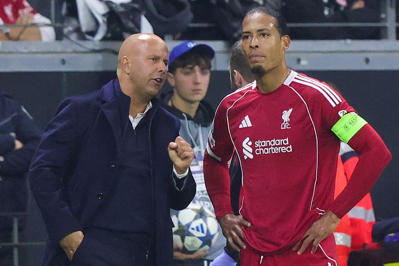 FRANKFURT AM MAIN, GERMANY - OCTOBER 22: Head coach Arne Slot of Liverpool FC talks to Virgil van Dijk of Liverpool FC during the UEFA Champions League 2025/26 League Phase MD3 match between Eintracht Frankfurt and Liverpool FC at Frankfurt Stadion on October 22, 2025 in Frankfurt am Main, Germany. (Photo by Ralf Ibing - firo sportphoto/Getty Images)