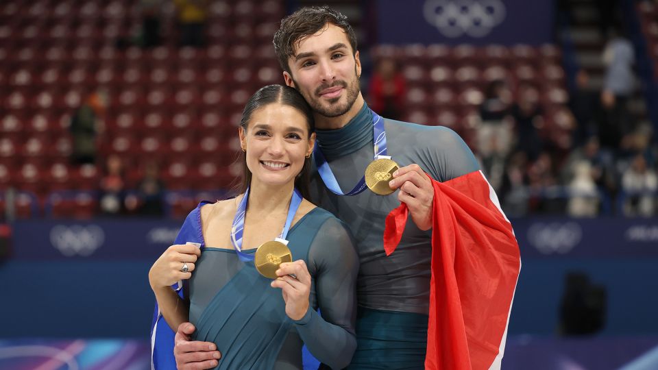 Gold medalists Laurence Fournier Beaudry and partner Guillaume Cizeron of Team France pose for a photo after the medal ceremony. - Matthew Stockman/Getty Images