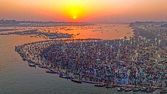 A view of Triveni Sangam during sunset as devotees offer prayers on the occasion of Maha Shivratri. 
