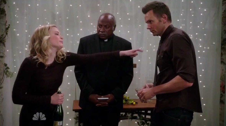 Britta and Jeff drunkenly exchange bitter vows in front of the minister at Shirley's wedding rehearsal on