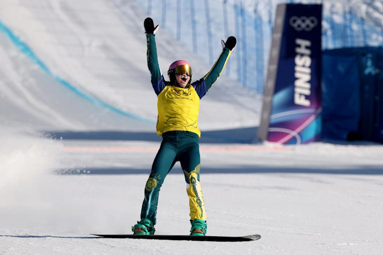 Josie Baff crosses the line to claim gold in the women’s snowboard cross final. 