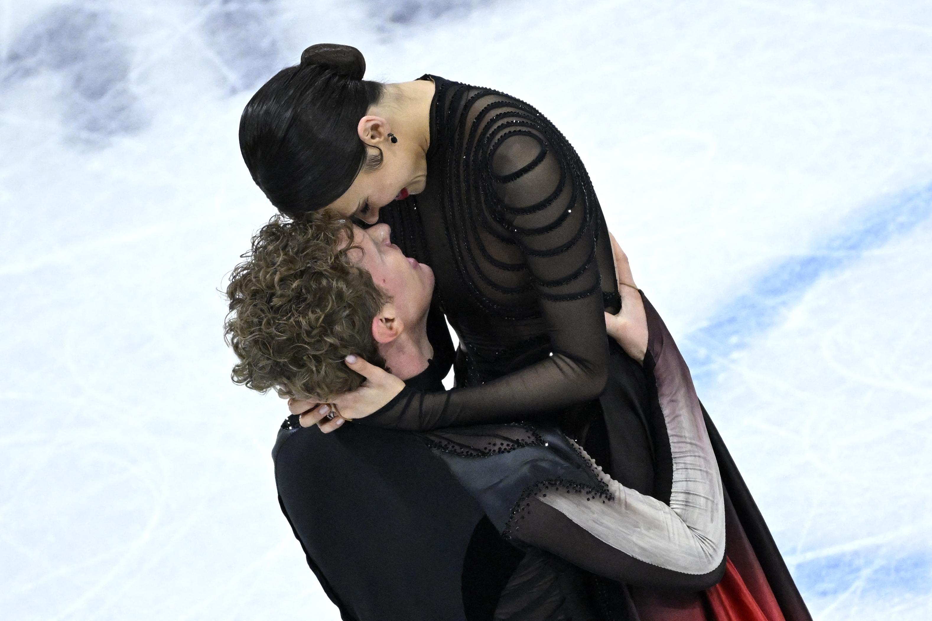 Bringing the heat: The real-life couples setting Olympic ice dance on fire